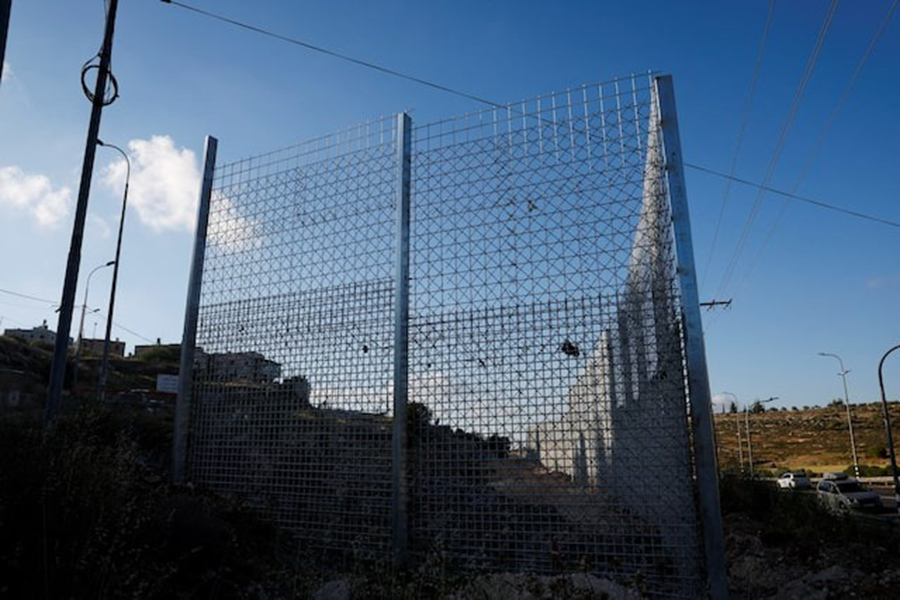 A view shows a part of the fence, which was set by the Israeli authorities, in Sinjil, near Ramallah, in the Israeli-occupied West Bank on May 5, 2025.