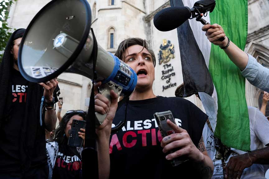 Lisa Minerva Luxx of the pro-Palestinian campaign group Palestine Action delivers a speech outside the High Court in London, Britain, Jul 4, 2025.