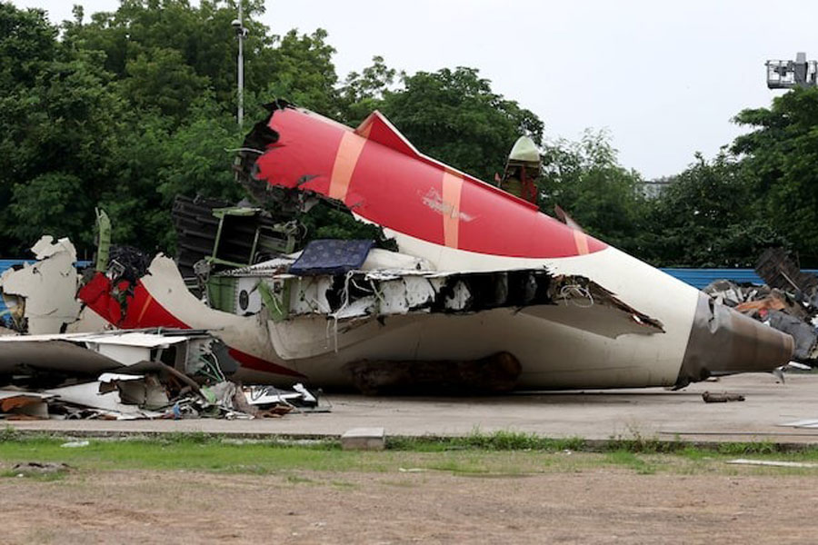 Wreckage of the Air India Boeing 787-8 Dreamliner plane sits on the open ground, outside Sardar Vallabhbhai Patel International Airport, where it took off and crashed nearby shortly afterwards, in Ahmedabad, India July 12, 2025.
