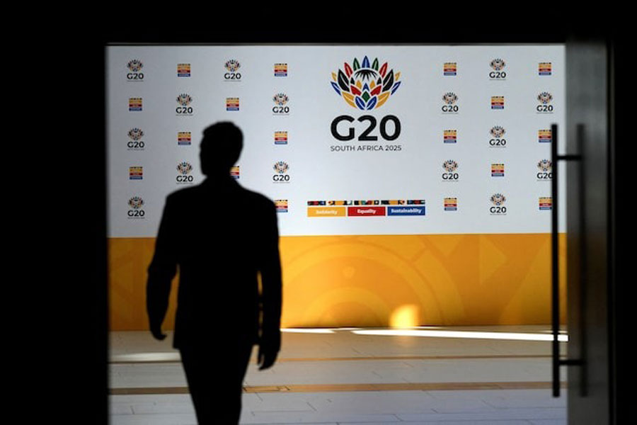 A man walks at the Cape Town International Convention Centre during day two of the four day G20 Finance Ministers meeting in Cape Town, South Africa, February 25, 2025.