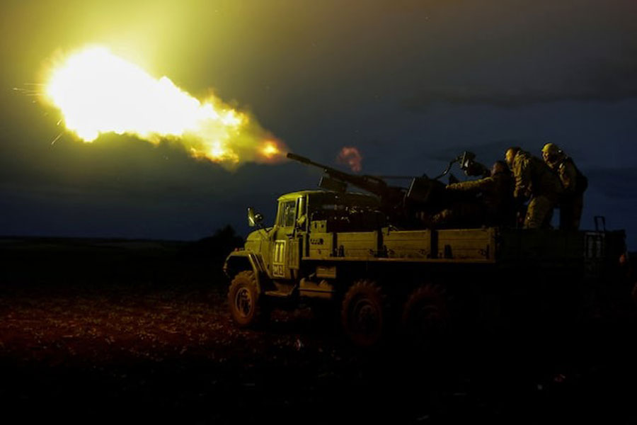 Servicemen from the mobile air defence unit of the 115th Separate Mechanized Brigade of the Ukrainian Armed Forces fire a ZU-23-2 anti-aircraft cannon towards a Russian drone during an overnight shift, amid Russia's attack on Ukraine, in Kharkiv Region, Ukraine June 2, 2025.