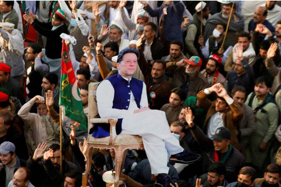 Supporters of the former Pakistani Prime Minister Imran Khan's party, the Pakistan Tehreek-e-Insaf (PTI), carry a cutout of him, as they gather, to protest what they call a black day and a stolen mandate in last year's general election, during a rally in Swabi, Pakistan Feb 8, 2025.