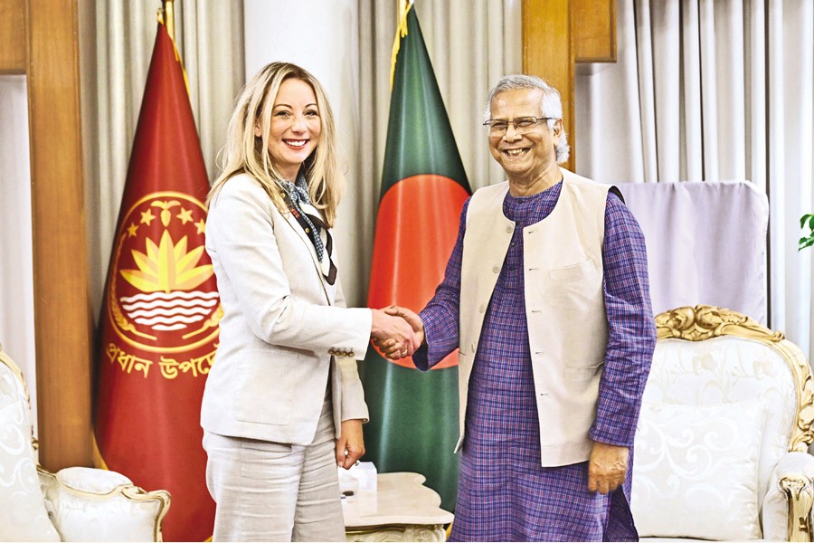 Chief Adviser Prof Muhammad Yunus shakes hands with Vice President of Global Operations at Starlink Lauren Dreyer at the state guesthouse Jamuna in the capital on Friday.