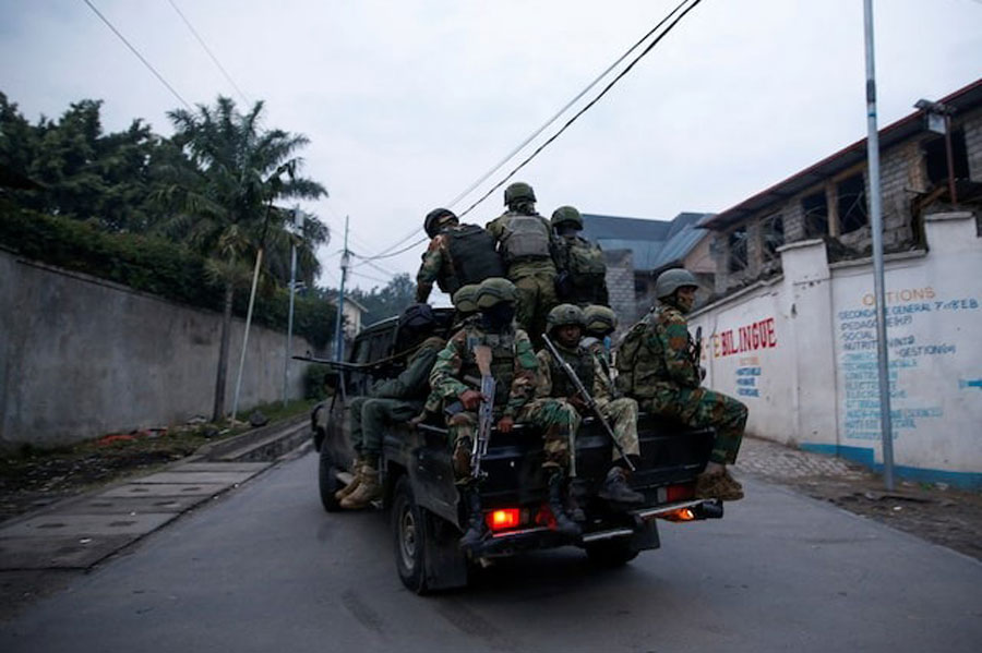 Members of the M23 rebel group ride on a pickup truck as they leave their position for patrols amid conflict between them and the Armed Forces of the Democratic Republic of the Congo (FARDC), in Goma, eastern Democratic Republic of the Congo, January 29, 2025.