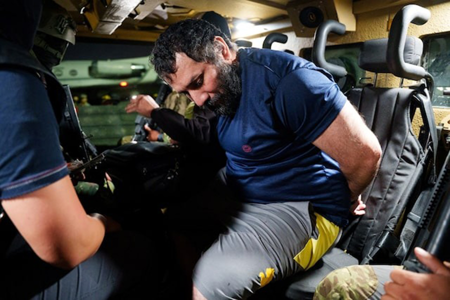 Jose Adolfo Macias known as "Fito", the leader of the Los Choneros criminal group, sits in an armoured personnel carrier after he was recaptured following his escape from a Guayaquil prison in 2024, in Guayaquil, Ecuador, in this handout picture obtained by Reuters on June 26, 2025 — Ecuadorean Armed Forces/Handout via REUTERS/File