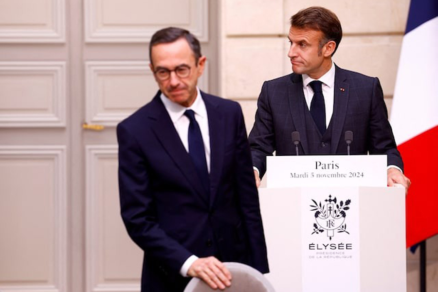 French President Emmanuel Macron and French Interior Minister Bruno Retailleau attend an event at the Elysee Palace in Paris, France, November 5, 2024.