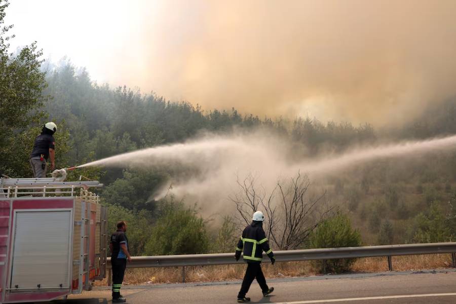 Firefighters respond to a wildfire near Osmaneli in the western Bilecik province, Turkey, July 24, 2025.