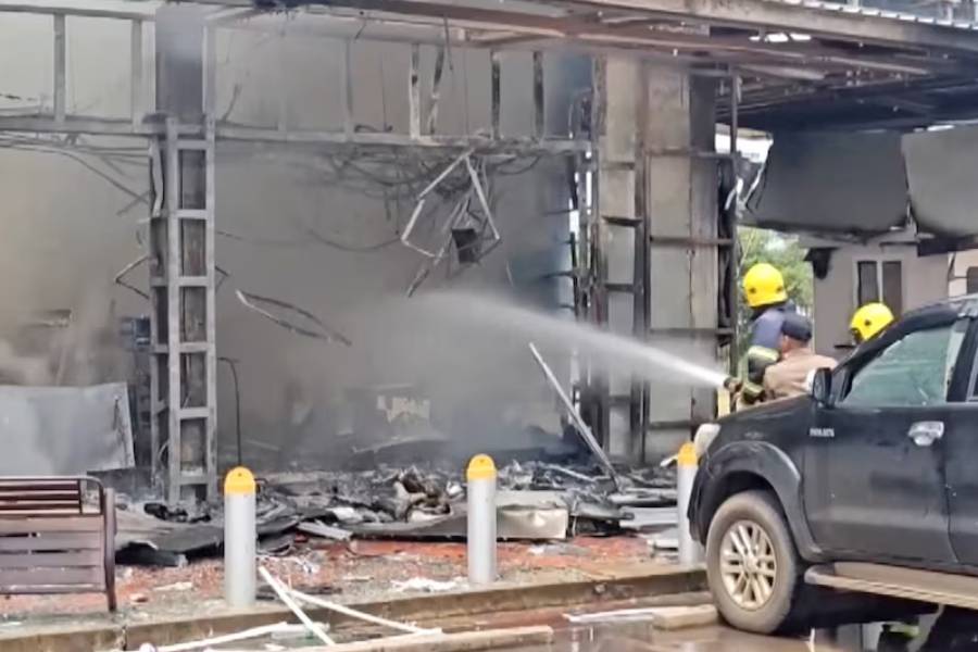 Firefighters work to extinguish fire at a convenience store at a gas station, amid the clashes between Thailand and Cambodia, in Kantharalak district, Sisaket province, Thailand, July 24, 2025, in this screengrab obtained from a handout video.