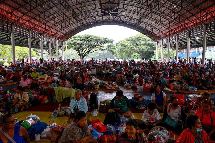 People rest inside a temporary shelter in Srisaket province, after Thailand and Cambodia exchanged heavy artillery fire for a second day on Friday as border fighting intensified and spread, while Cambodia's leader said Thailand had agreed to a Malaysian ceasefire proposal but then backed down, Thailand, July 26, 2025.