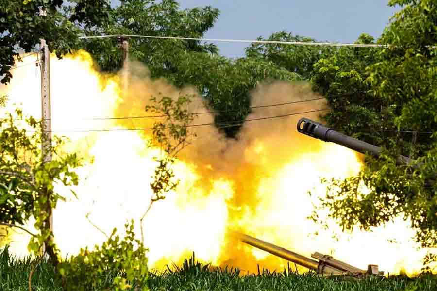 A Thai military mobile unit fires towards Cambodia's side after Thailand and Cambodia exchanged heavy artillery on Friday as their worst fighting in more than a decade stretched for a second day, in Surin, Thailand, Jul 25, 2025.