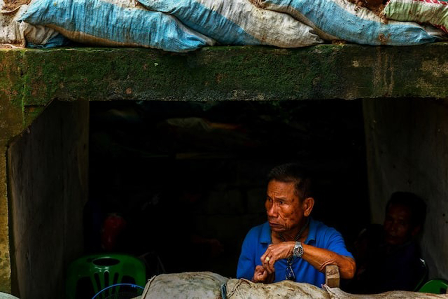 A man looks on inside a bunker in Sisaket province, as Cambodia and Thailand each said the other had launched artillery attacks across contested border areas early on Sunday, hours after US President Donald Trump said the leaders of both countries had agreed to work on a ceasefire, Thailand, July 27, 2025.