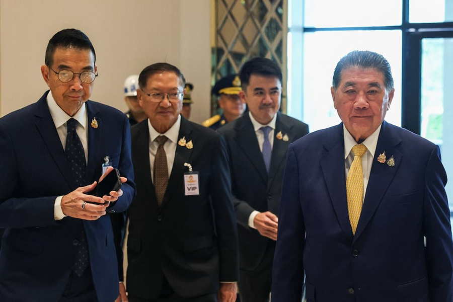 Thailand's acting prime minister, Phumtham Wechayachai and Thailand's Minister of Foreign Affairs Maris Sangiampongsa walks after the press conference at the base of Wing 6 of the Royal Thai Air Force ahead of their departure to Malaysia for ceasefire talks on the deadly border conflict between Thailand and Cambodia that extended to a fifth day, in Bangkok, Thailand, on July 28, 2025 — Reuters photo