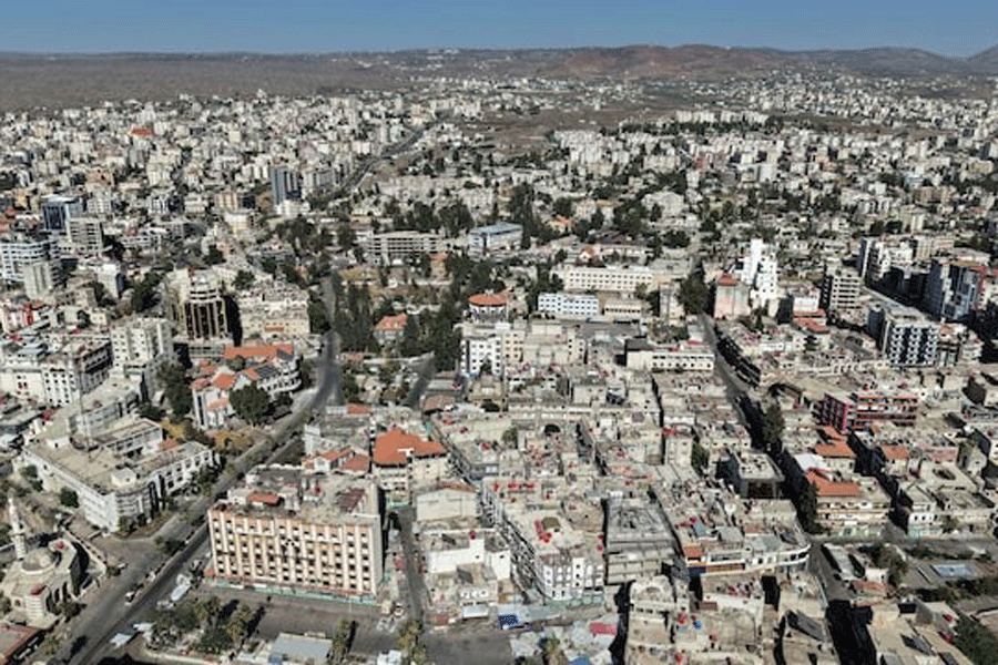 A drone view shows the predominantly Druze city of Sweida, following deadly clashes between Druze fighters, Sunni Bedouin tribes and government forces, in Syria July 25, 2025.