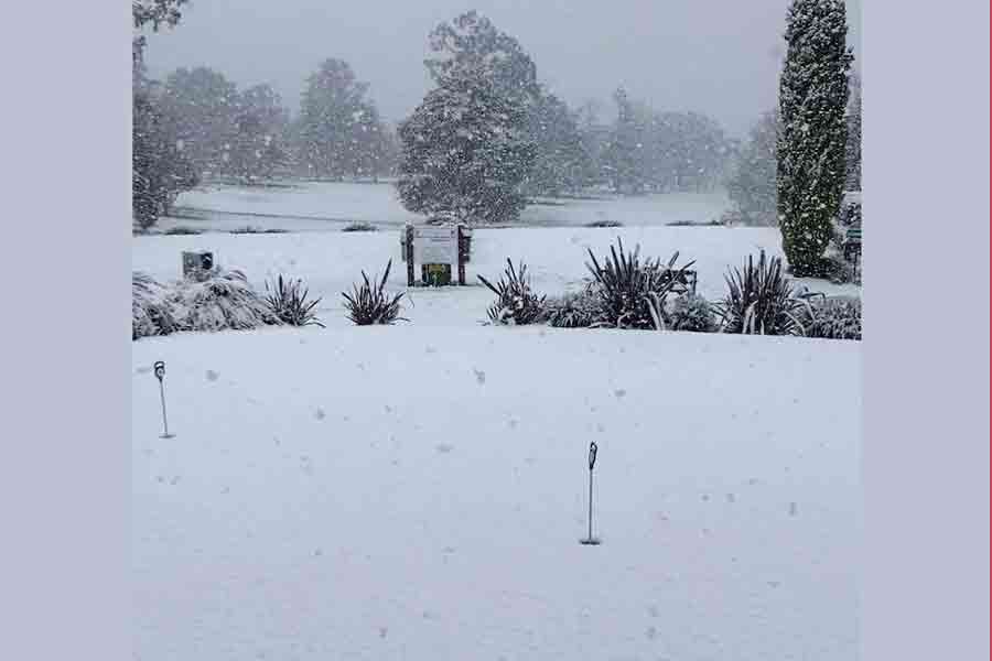 Snow blankets the grass at a Golf Club, in Armidale, New South Wales, Australia, August 2, 2025, in this screengrab obtained from social media video.