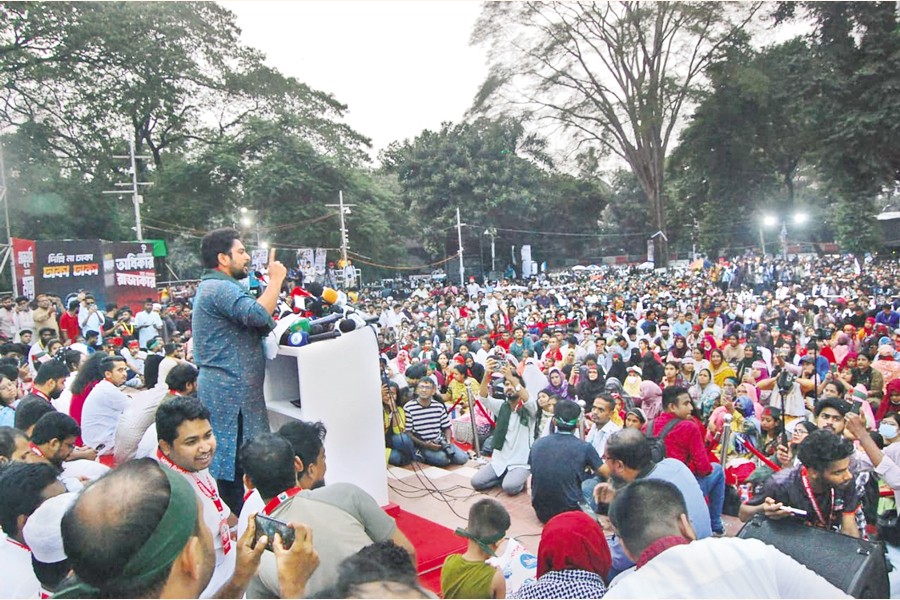NCP Convener Nahid Islam speaks at a rally held at the Central Shaheed Minar in Dhaka on Sunday, marking the first anniversary of the announcement of the one-point demand-ouster of the then Sheikh Hasina-led autocratic government