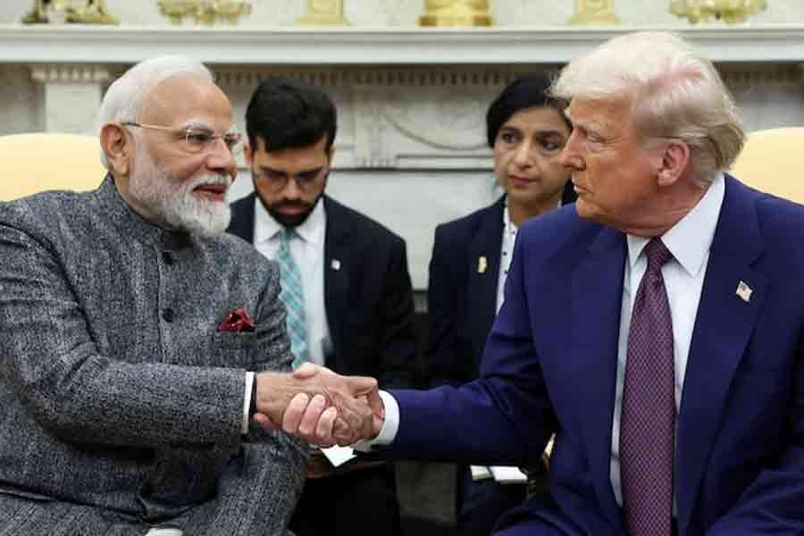 US President Donald Trump and Indian Prime Minister Narendra Modi shake hands, at the White House in Washington, DC, US, February 13, 2025.