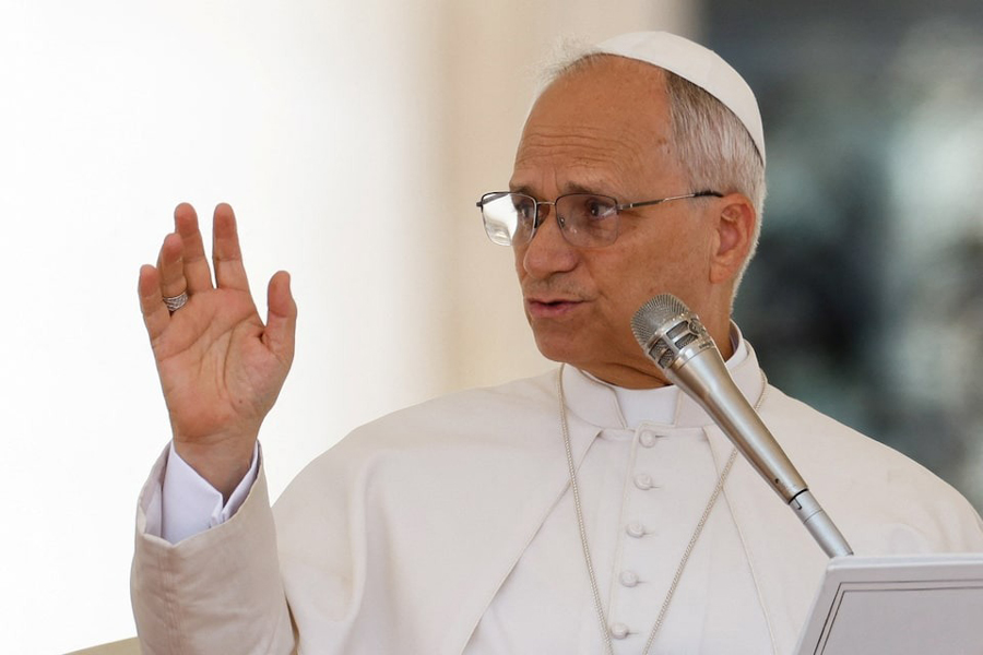 Pope Leo XIV blesses the audience at the end of a general audience in St. Peter's Square, at the Vatican, August 6, 2025.