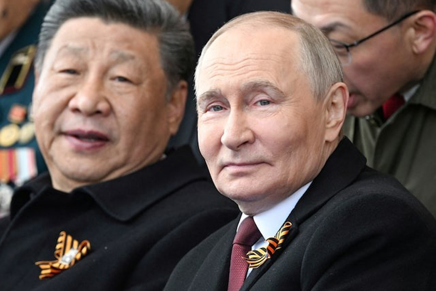 Russian President Vladimir Putin and his Chinese counterpart Xi Jinping attend a military parade on Victory Day, marking the 80th anniversary of the victory over Nazi Germany in World War Two, in Red Square in central Moscow, Russia, May 9, 2025.