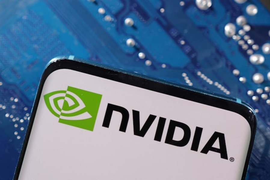 A smartphone with a displayed NVIDIA logo is placed on a computer motherboard in this illustration taken on March 6, 2023 — Reuters/File