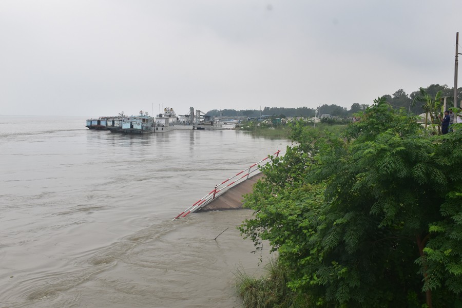 Photo shows the collapsed jetty of Paturia launch terminal in the Shibaloy Upazila of Manikganj district