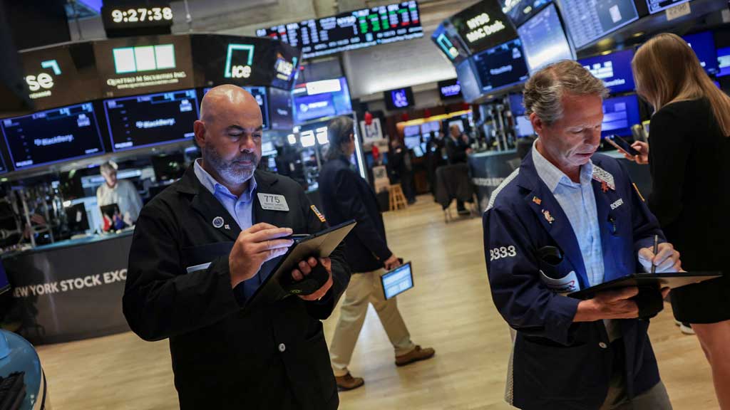 Traders work on the floor at the New York Stock Exchange (NYSE) in New York City, US, August 6, 2025. REUTERS