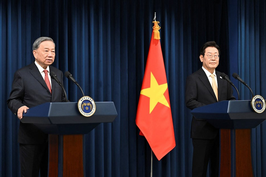 South Korean President Lee Jae Myung stands with General Secretary of the Communist Party of Vietnam To Lam during a joint statement at the presidential office on August 11, 2025 in Seoul, South Korea.