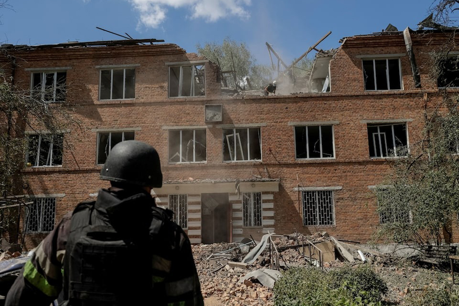 Rescuers work at the site where a hospital was damaged during a Russian air strike, amid Russia's attack on Ukraine, in Kharkiv, Ukraine July 25, 2025.