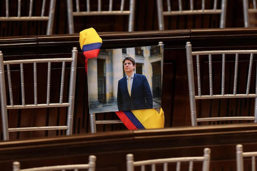 A picture of Colombian Senator Miguel Uribe Turbay of the opposition Democratic Center party hangs from a chair during the opening of the new session of the Colombian Congress, in Bogota, Colombia, July 20, 2025.