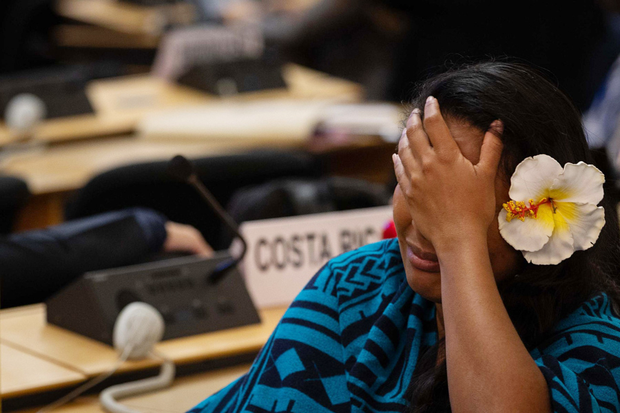 An exhausted delegate reacts to the outcome of the UN negation as developing a landmark treaty to end plastic pollution have once again failed in Geneva last week —IISD/ENB Photo