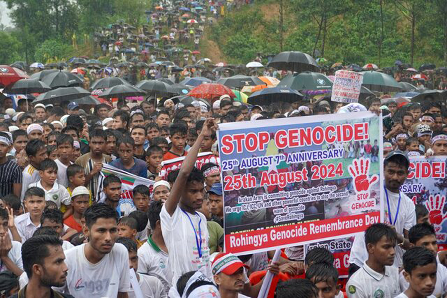 Rohingya refugees gather to mark the seventh anniversary of their fleeing from neighbouring Myanmar to escape a military crackdown in 2017, during heavy monsoon rains in Cox's Bazar, Bangladesh, August 25, 2024 — REUTERS Photo