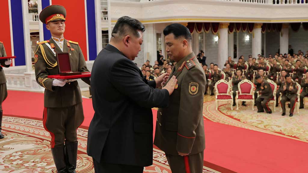 North Korean leader Kim Jong attends a national commendation ceremony for the commanders and fighters of the Korean People's Army's overseas operations unit, at the headquarters of the Central Committee of the Korean Workers' Party, in Pyongyang, North Ko
