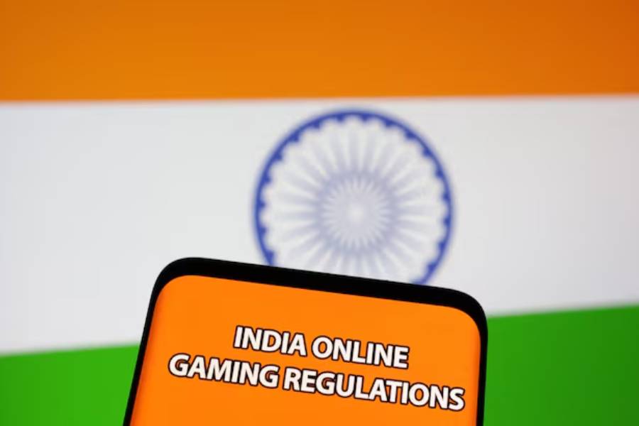 The words “India online gaming regulations” are displayed in front of an Indian flag in this Illustration taken September 14, 2022.