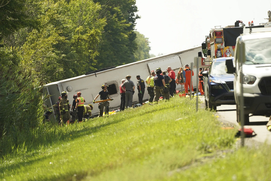 First responders work to rescue victims at the scene of a tour bus that crashed and rolled over on the New York State Thruway near Pembroke, NY on Friday, August 22, 2025 — Photo via AP