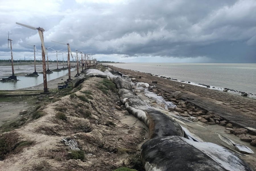 Photo shows the existing embankment which has developed cracks under the impact of sea erosion in island upazila Kutubdia of Cox's Bazar district-