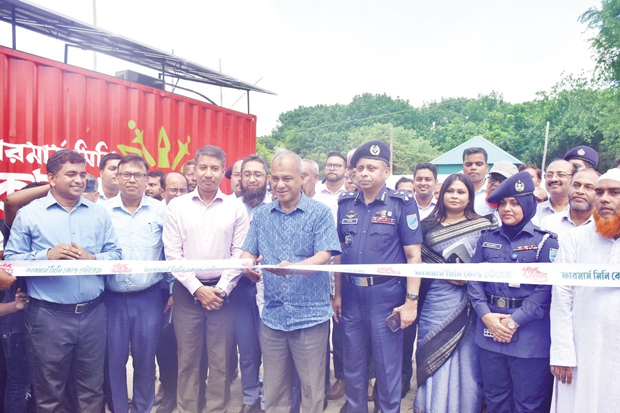 Lieutenant General (Retd) Md Jahangir Alam, Adviser to the Ministries of Agriculture and Home Affairs, inaugurating the Farmers Mini Cold Storage in Medulia village of Dhalla Union under Singair Upazila, Manikganj on Wednesday
