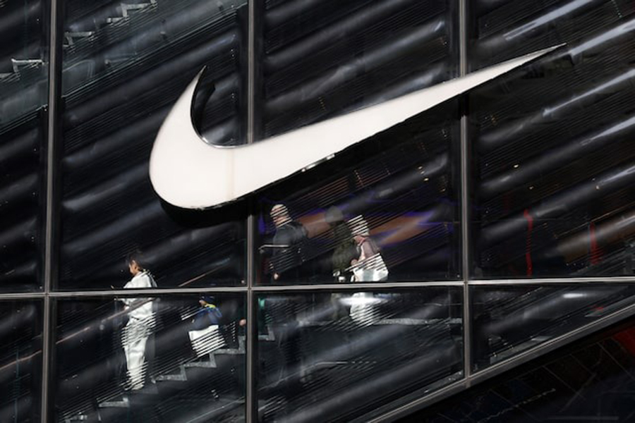 People descend stairs inside a Nike store in New York City, US on April 2, 2025 — Reuters/File