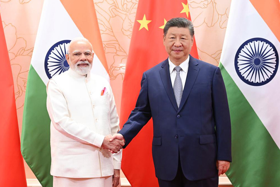 Chinese President Xi Jinping (R) meets with Indian Prime Minister Narendra Modi (L) in Tianjin, north China on Sunday. Modi is in China to attend the Shanghai Cooperation Organization (SCO) Summit 2025. — Xinhua Photo