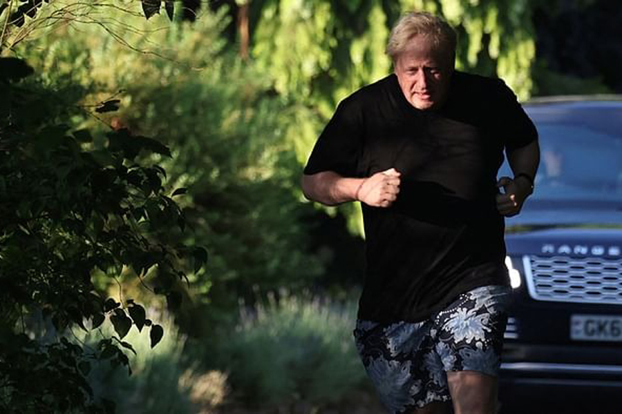 Former British Prime Minister Boris Johnson runs near his home in Brightwell-cum-Sotwell, Oxfordshire, Britain, June 15, 2023.