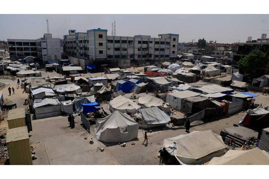 Palestinians displaced by the Israeli military offensive shelter in an UNRWA school, in Khan Younis, in the southern Gaza Strip, Aug 19, 2025.