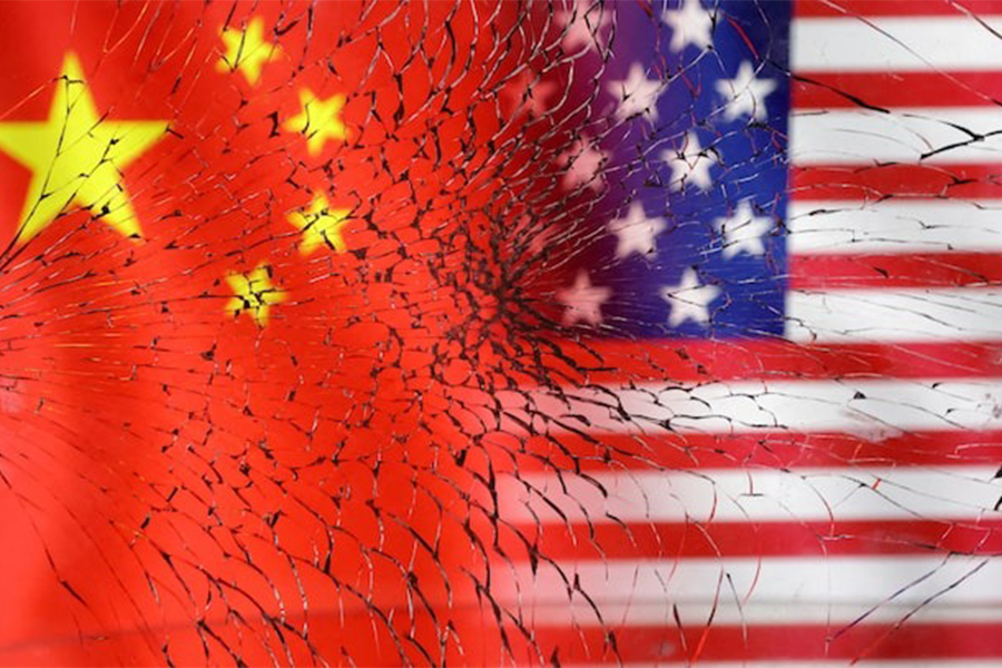 US and Chinese flags are seen through broken glass in this illustration created on January 30, 2023 — Reuters/File