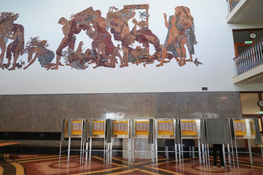 A person votes in a polling station in Oslo, Norway, September 8, 2025.