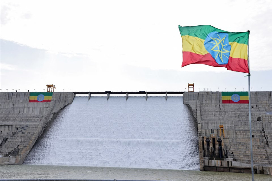 An Ethiopian flag flutters in the wind next to the Grand Ethiopian Renaissance Dam (GERD), built along the Blue Nile, during its inauguration, in Guba, Benishangul-Gumuz region, Ethiopia, September 9, 2025.