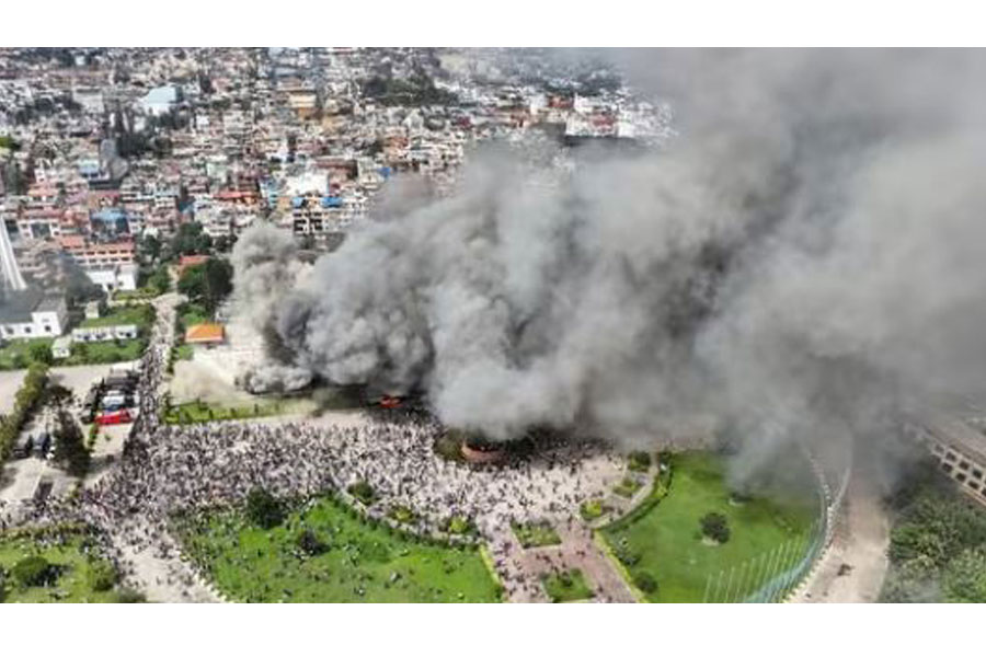 Plumes of black and grey smoke were seen in the Parliament premises as protesters stormed the building amid their anti-government protests. (X/@RONBupdates)