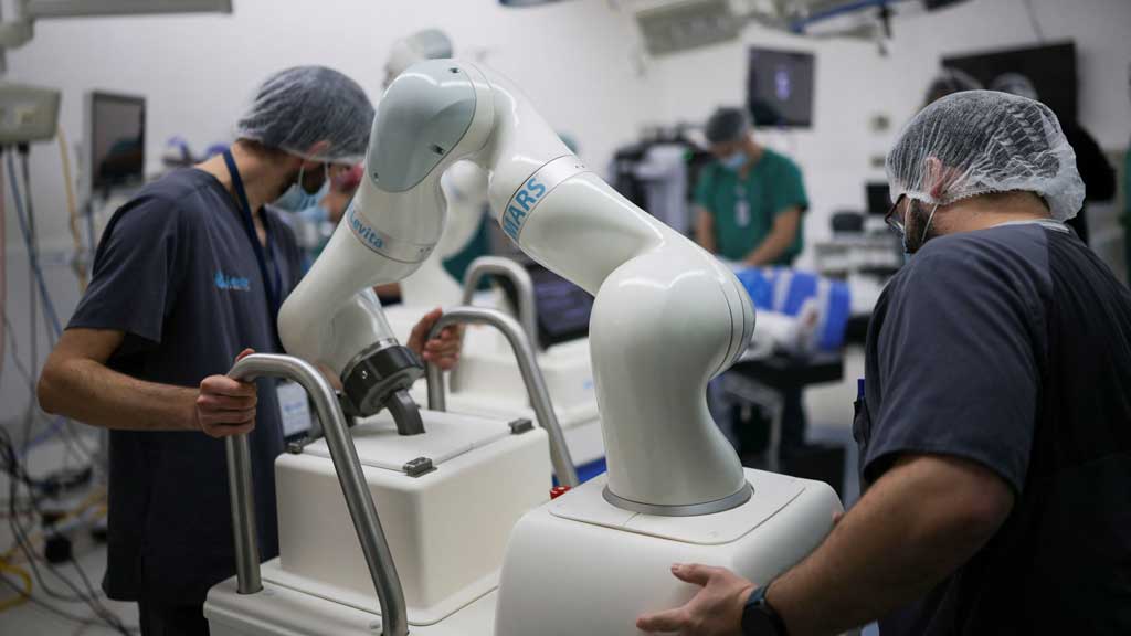 Engineers from Levita Magnetics, a Silicon Valley-based medical device company, move two MARS (Magnetic-Assisted Robotic surgery) robots for an upcoming surgery at Clinica Las Condes, in Santiago, Chile Sept 8, 2025.