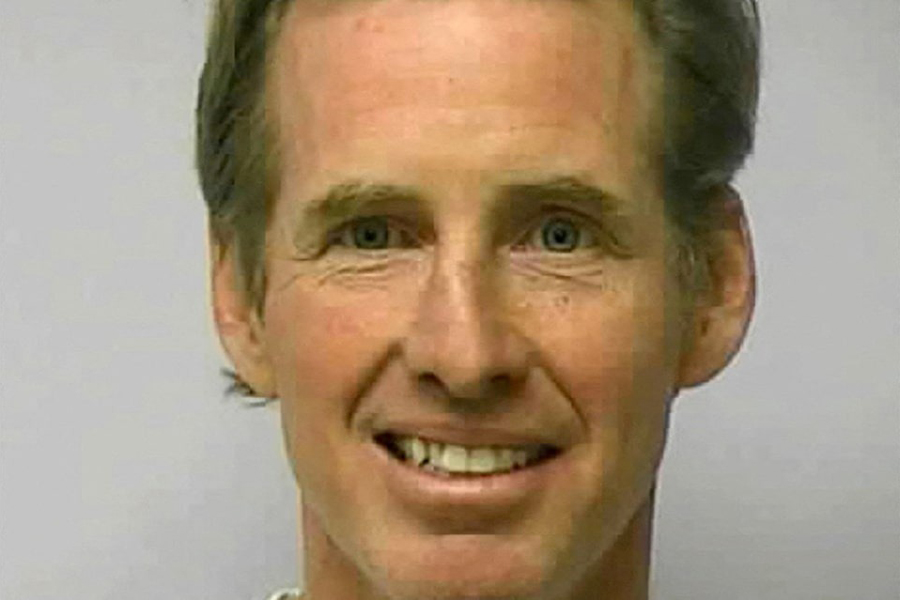 Ryan W Routh poses in a jail booking photograph in Greensboro, North Carolina, US, February 10, 2010.