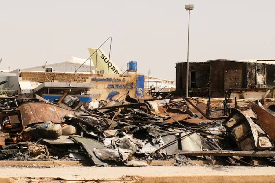 A view of a burned building and the tail of a Sudan Airways aircraft amid debris at Khartoum Airport, after the Sudanese army deepened its control over Khartoum from the Rapid Support Forces (RSF), in Khartoum Sudan April 26, 2025.