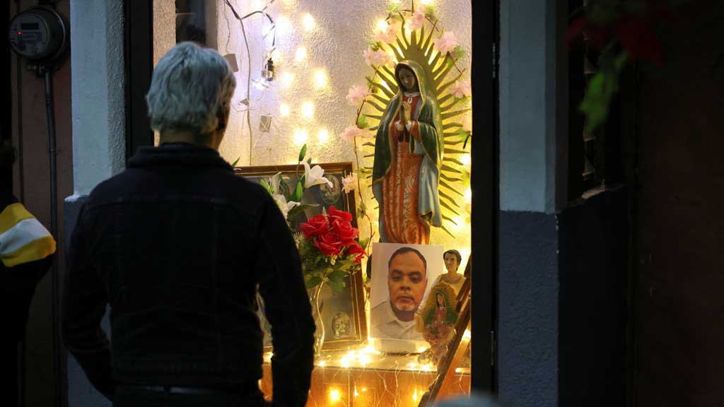 A relative attends the wake of Javier Becerra Urieta, 49, an Uber taxi driver who died at a hospital after sustaining burn injuries in the explosion of a tanker truck carrying liquefied petroleum gas (LPG), in the Iztapalapa borough of Mexico City, Mexico, September 19, 2025. REUTERS