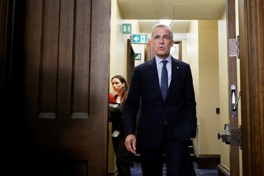 Canada's Prime Minister Mark Carney walks to the House of Commons for Question Period on Parliament Hill in Ottawa, Ontario, Canada September 15, 2025.