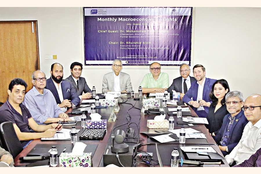 Experts pose for a photo at a programme titled 'Monthly Macroeconomic Insights', organised by the Policy Research Institute of Bangladesh (PRI) in Dhaka, on Tuesday. Former Bangladesh Bank Governor Mohammed Farashuddin was present as the chief guest with PRI Executive Director Khurshid Alam chairing the event. — FE Photo