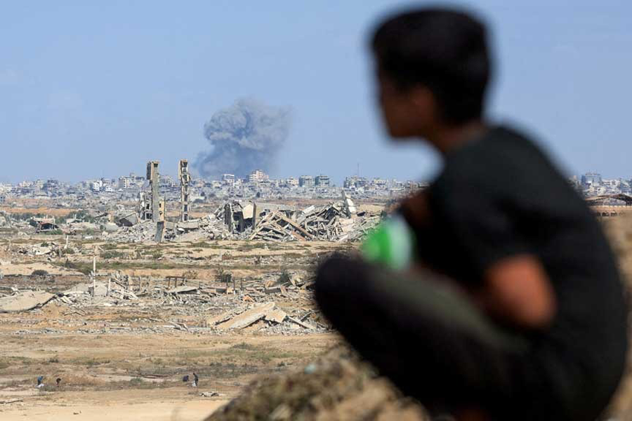 Smoke rises following explosions amid the Israeli military offensive in Gaza City, as seen from the central Gaza Strip, Oct 6, 2025.